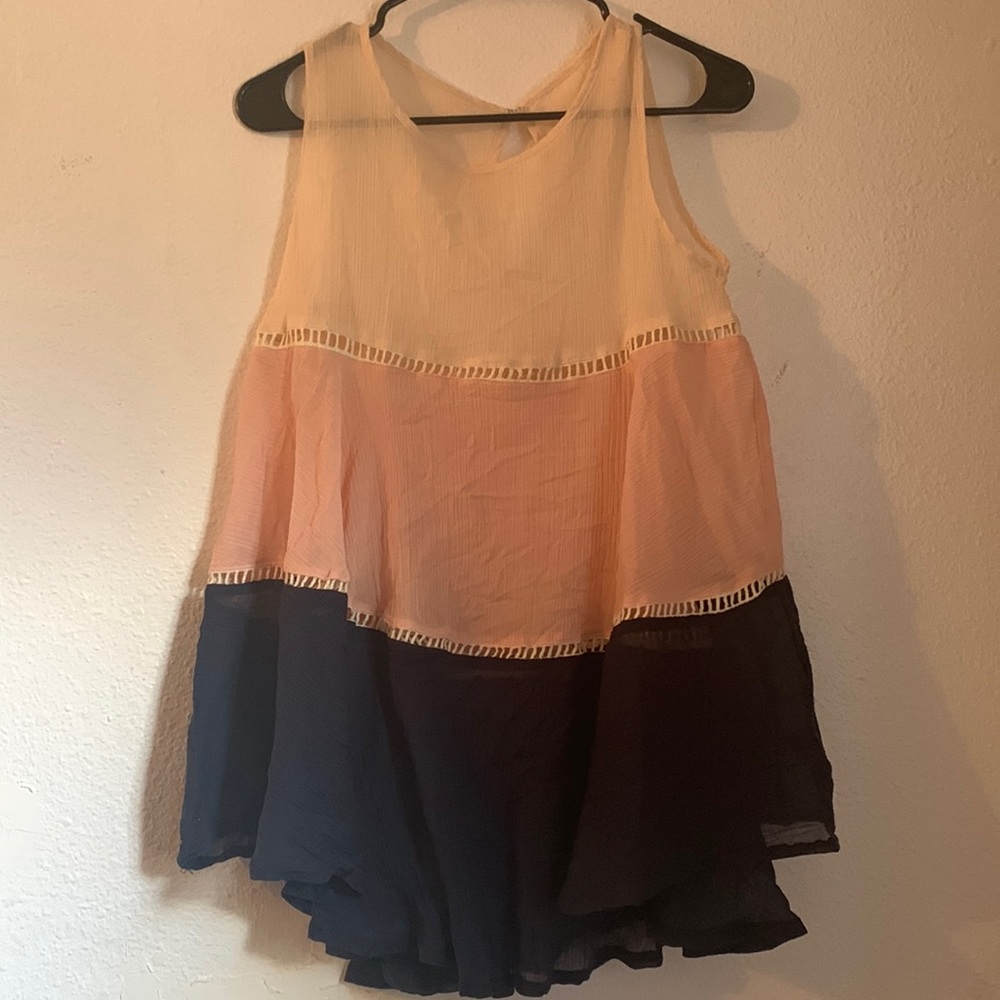 Size large colorblock tank. Never worn.